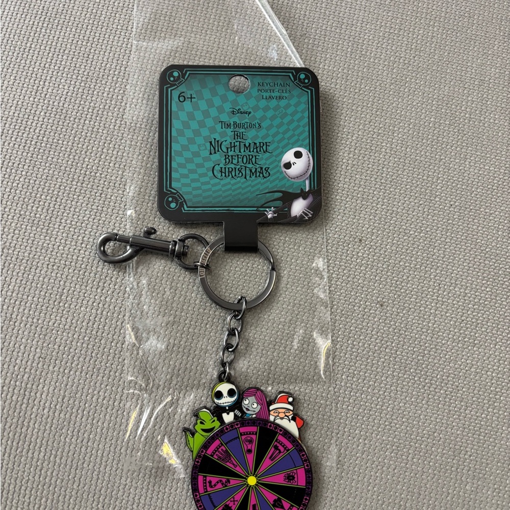 The Disney TNBC Nightmare Before Christmas Loungefly Roulette Spinner Keychain